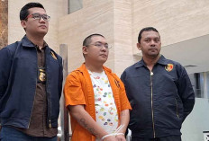 Polisi Tangkap DPO Pendiri Robot Trading, Kerugian Capai Rp1,8 Triliun 