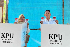 Calon Bupati Nomor Urut 1, Burhanudin, Gunakan Hak Pilih di TPS 03 Desa Mayang