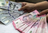 Rupiah Menguat, Ditopang Kenaikan Harga Pertamax dan Suku Bunga BI