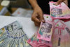 Rupiah Menguat 152 Poin ke Rp17.709 per Dolar AS, Dipicu Sentimen Positif AS dan Iran